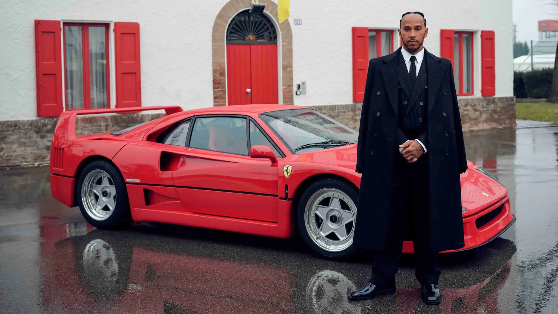 Lewis Hamilton standing next to the Ferrari F40 at Maranello — Lewis Hamilton Ferrari F40 January 2025